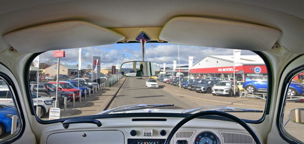 Image of a car windscreen looking out to the Dicksons of Inverness forecourt
